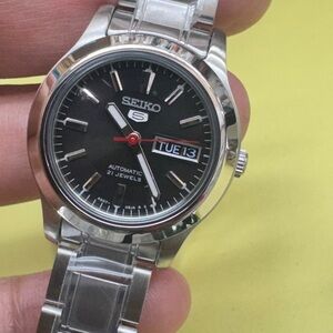 Seiko Silver Automatic Watch with Day-Date . extra small .about quarter coin